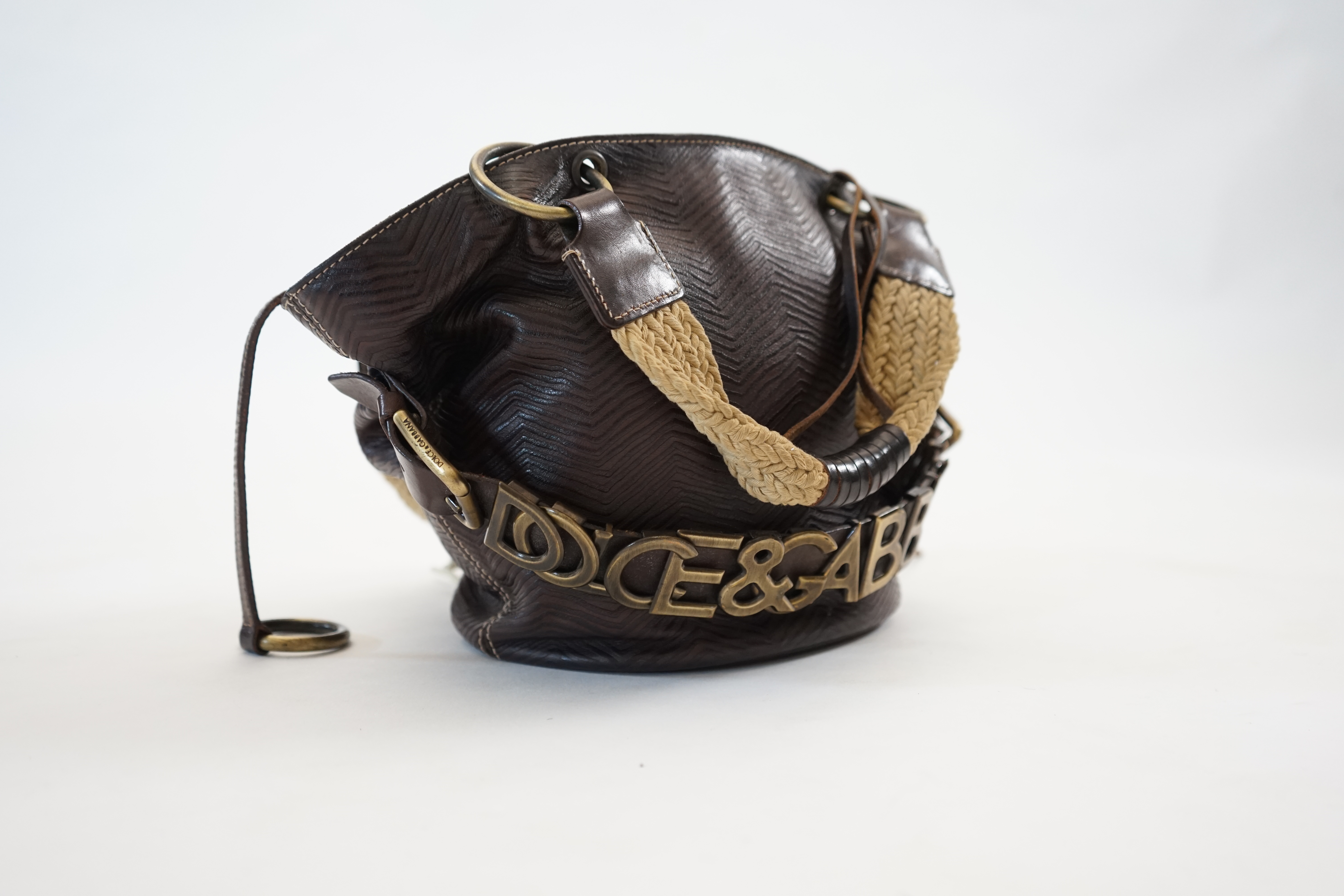 A Dolce & Gabbana brown and black leather bucket bag, width (max) 34cm, depth 14cm, height 20cm